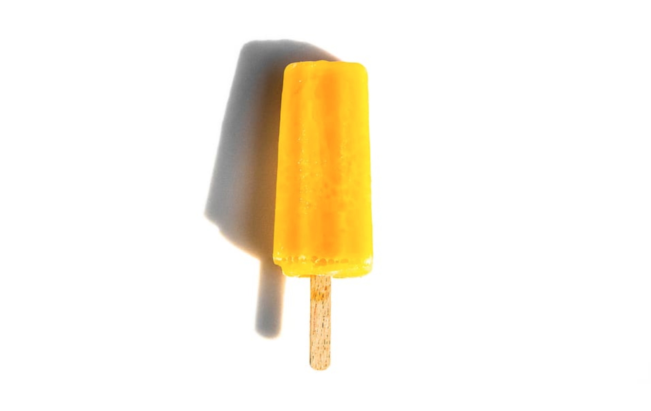 image of an orange popsicle